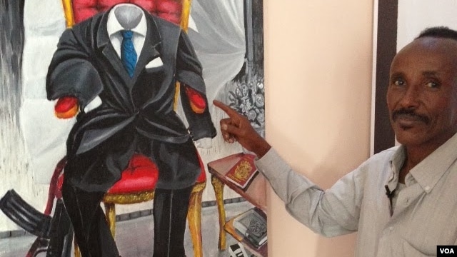 FILE - Somali artist Affey with his painting 'Empty Suit', representing diaspora politicians.