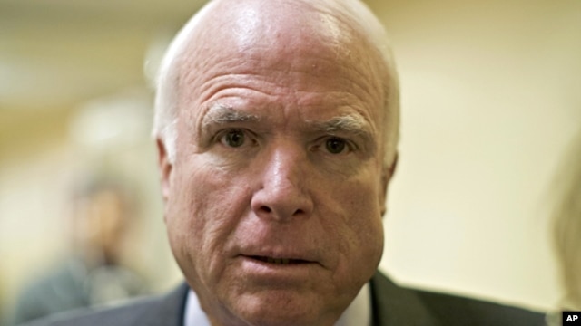 Senator John McCain speaks with reporters on Capitol Hill in Washington, Jan. 22, 2013, about the situation in Syria.