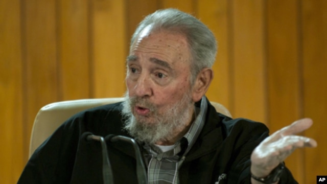 Former Cuban leader Fidel Castro speaks during a meeting with Cuban and foreign intellectuals visiting Havana's international book fair February 15, 2011.