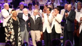 (From left) Jessye Norman, John Williams, Steven Spielberg, Yo-Yo Ma, Keith Lockhart and James Taylor celebrate the composer's 80th birthday onstage at Tanglewood, the summer home of the Boston Symphony Orchestra in western Massachusetts. (Hilary Scott)