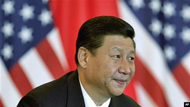 Chinese Vice President Xi Jinping and US counterpart Joe Biden [no shown] attend a meeting with US and Chinese business leaders at the Beijing Hotel in Beijing, China, August 19, 2011.