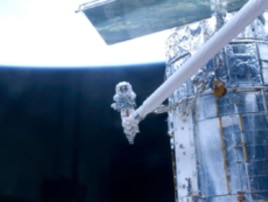 STS-125 Mission Specialist John Grunsfeld participates in the mission's fifth and final session of extravehicular activity (EVA).