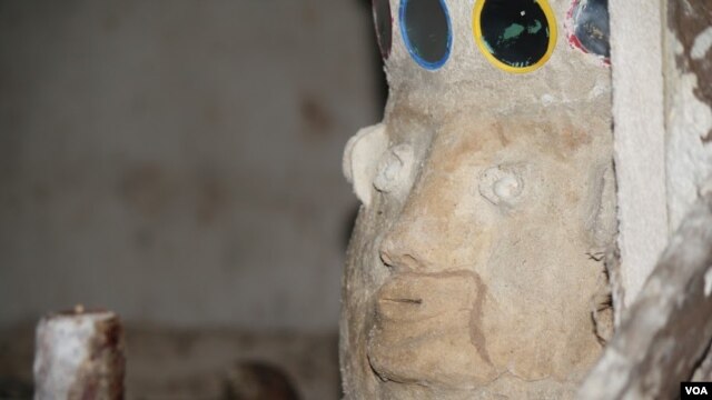 Traditional West African magic called juju is used to both convince girls they are bound to traffickers for survival and that they have been freed. (VOA/Heather Murdock)