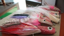 Some of Elpheus Ndlovu's sailfish flies. (Darren Taylor for VOA News)