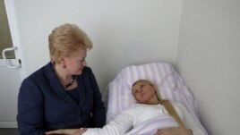 Lithuania's President Dalia Grybauskaite visits imprisoned former Ukrainian Prime Minister Yulia Tymoshenko in a hospital in the eastern Ukrainian city of Kharkiv, May 11, 2012. 