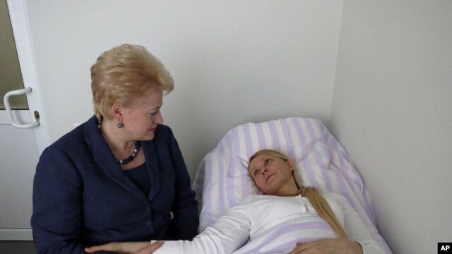 Lithuania's President Dalia Grybauskaite visits imprisoned former Ukrainian Prime Minister Yulia Tymoshenko in a hospital in the eastern Ukrainian city of Kharkiv, May 11, 2012. 