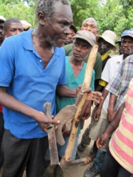 Many farmers in Haiti use rudimentary tools.