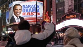 People celebrate in Times Square after Barack Obama was projected to win the U.S presidential election in New York November 6, 2012. 