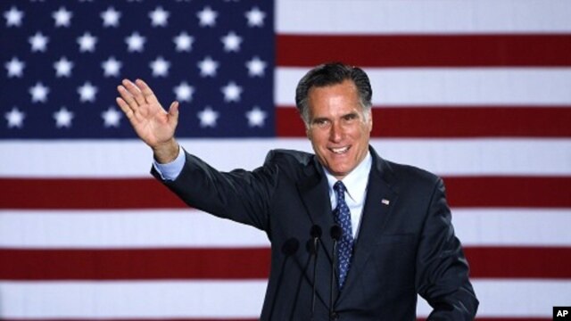 Republican Presidential candidate, former Massachusetts Gov. Mitt Romney declares victory in the Wisconsin presidential primary, April 3, 2012, at the Grain Exchange in Milwaukee. 