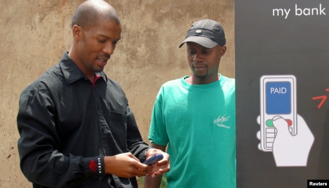 Cell phones are serving as a bank in your pocket, providing virtual accounts for South Africans excluded from the financial mainstream, Johannesburg's Soweto township, October 19, 2005.