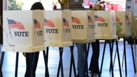 Citizens vote on Election Day at a fire station in Alhambra, Los Angeles County, California, Nov. 6, 2012.