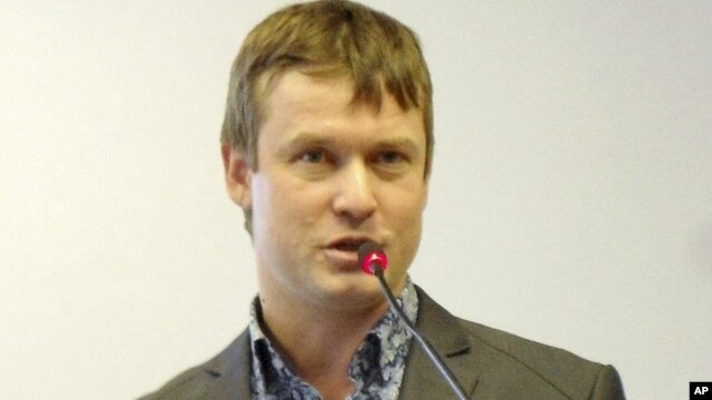 This undated photo shows Leonid Razvozzhayev speaking in an undisclosed location and is provided by the Assocoated Press Television News, October 22, 2012. 