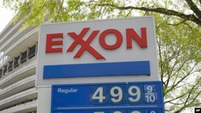 Prices posted at a US gasoline station, April 20, 2011