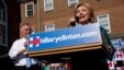 Democratic presidential candidate Hillary Clinton takes the stage for a rally with Virginia Governor Terry McAuliffe in Alexandria, Virginia, Oct. 23, 2015.