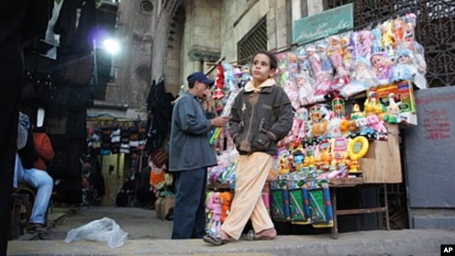 Children can look forward to presents of toys during the Eid festival in Cairo, Egypt, November 3, 2011.