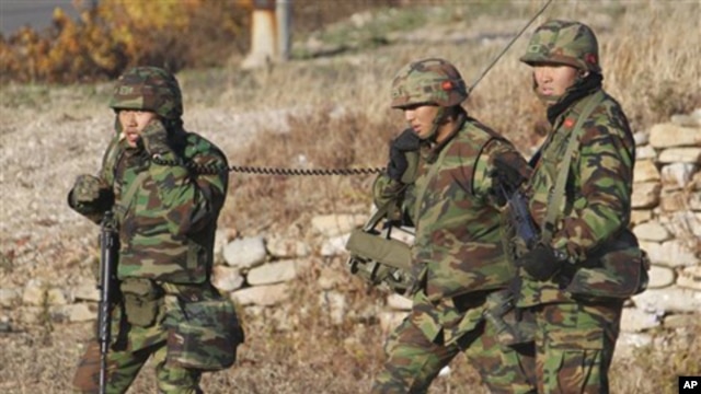 South Korean marines patrol on the South Korean island of Yeonpyeong. Nov. 26, 2010.