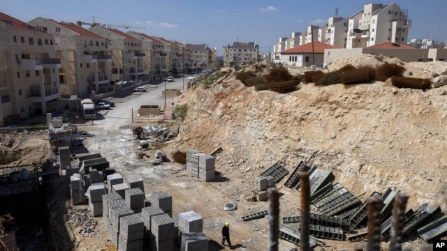 FILE- In this March 14, 2011, file photo, a general view of a construction site in the West Bank Jewish settlement of Modiin Illit.  