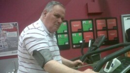D.W. Wilson, of Durham University's School of Medicine, Pharmacy, and Health, is one of dozens of scientists who wear blood pressure cuffs as part of Franz Halberg’s research. (Courtesy D.W. Wilson)