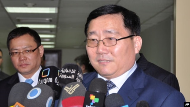 Chinese Ambassador Li Huaxin speaks to reporters after he met with Syrian assistant Foreign Minister Ahmed Arnus, March 6, 2012.