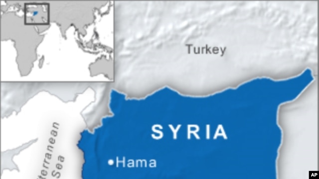 Syrian Activists: Tanks, Troops Raid Hama, Make Arrests