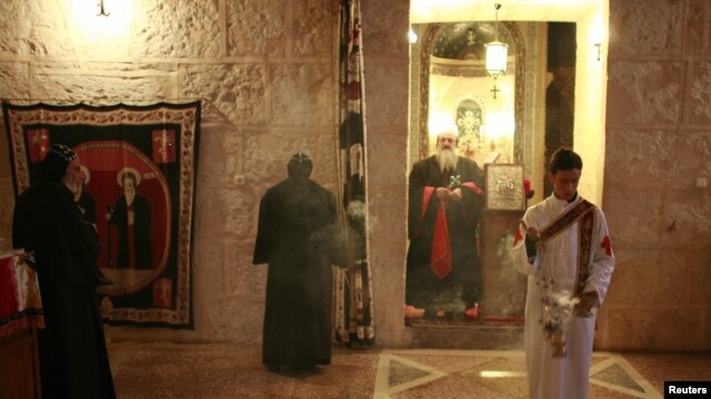 Syriac Christian monks attend a service in Mor Gabriel monastery in southeastern Turkey.