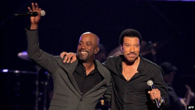 Darius Rucker, left, and Lionel Richie perform "Stuck on You" at a concert last week in Las Vegas, Nevada