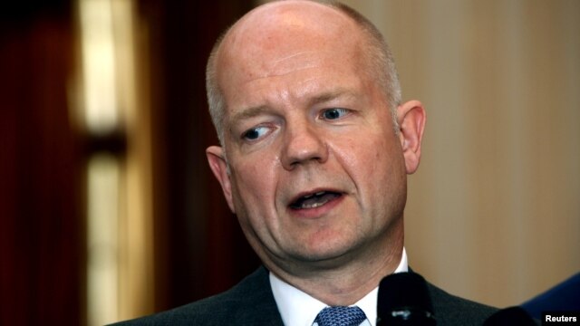 Britain's Foreign Minister William Hague speaks during a news conference in Tripoli, July 16, 2012. 