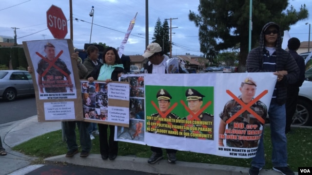 A crowd of Cambodian Americans rally against the visit of Lt. Gen. Hun Manet, Deputy Chairman of Joint Staff in the Royal Cambodian Armed Forces, and the eldest son of Prime Minister Hun Sen, in Long Beach, California, April 9, 2016.