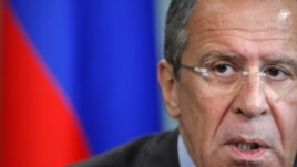 Russian Foreign Minister Sergei Lavrov, answers questions during Moscow news conference, June 28, 2012.