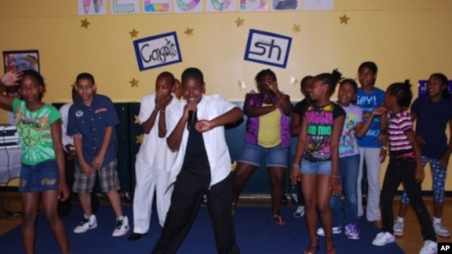 Younger members of Studio Heat performing at the release party for the music clubhouse's second CD, 'Because of You.'