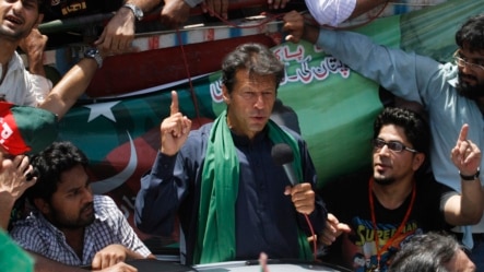 Imran Khan, Pakistani cricketer-turned-politician and chairman of political party Pakistan Tehreek-e-Insaf (PTI), addresses his supporters after his visit to the mausoleum of Mohammad Ali Jinnah, founder and first governor-general of Pakistan, during an e