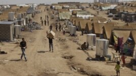 Penaberên Sûrî yên li Kampa Dumez ya li Duhokê. Tebax 13, 2012. 
