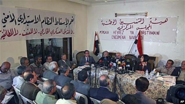 Syrian opposition members attend a Syrian opposition meeting in the Halboun area, near the capital Damascus, Syria, October 6, 2011.