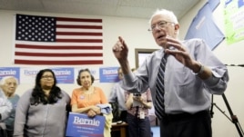 Sen. Bernie Sanders speaks to supporters during an open house at his Iowa campaign headquarters in Des Moines, Iowa.