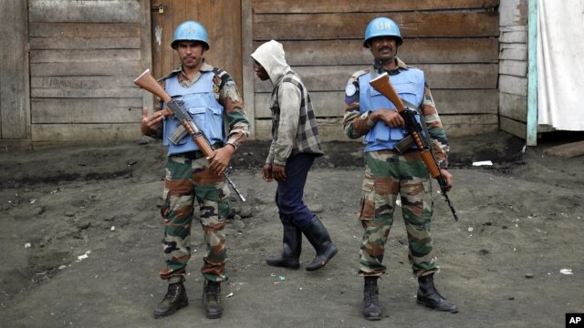 FILE - Two MONUSCO soldiers are seen standing guard in Goma, DRC.