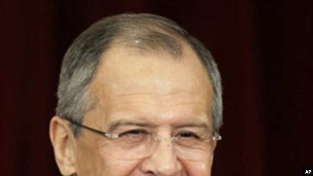 Russian Foreign Minister Sergey Lavrov smiles during a news conference in Moscow (File Photo)