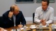 Russia's President Vladimir Putin (L) talks with Britain's PM David Cameron during a working session at the Lough Erne golf resort where the G8 summit is taking place in Enniskillen, Northern Ireland, June 18, 2013. 