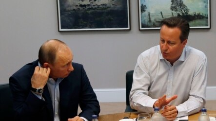 Ruski predsednik Vladimir Putin i premijer Dejvid Kameron na samitu G8