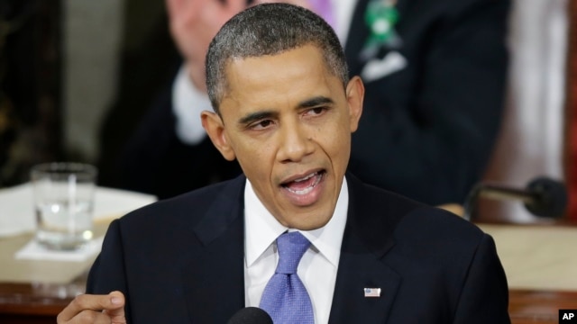 President Barack Obama gestures as he gives his State of the Union address during a joint session of Congress on Capitol Hill in Washington, Feb. 12, 2013