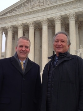 Alaska Senator Dan Sullivan (L) and Rod Arno, executive director of the Alaska Outdoor Council, in front of the U.S. Supreme Court, Jan. 20, 2016. (M. Snowiss/VOA)