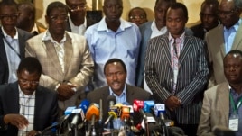 Kalonzo Musyoka, center, Kenya's current Vice President and running mate of presidential candidate Raila Odinga, speaks at a press conference in Nairobi, Kenya, Mar. 7, 2013.