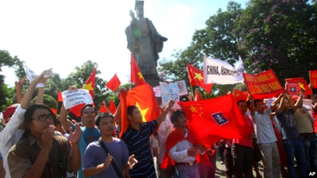Hundreds of Vietnamese hold a rare protest in Hanoi demanding China stay out of their country's waters Sunday, June 5, 2011.