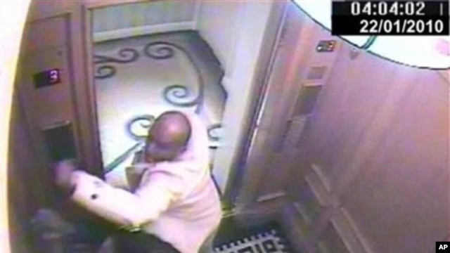 In this CCTV handout image issued by the Metropolitan Police, Saudi Arabian Prince Saud, in white jacket, attacks his servant, Bandar Abdulaziz, in a lift, 22 Jan 2010