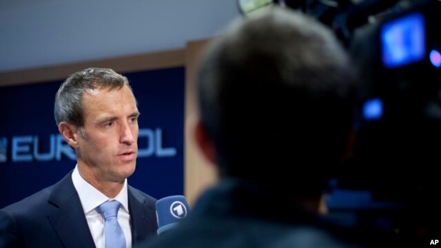 Trưởng cơ quan Europol Rob Wainwright trả lời câu hỏi sau một buổi họp báo ở The Hague, Hà Lan, 24/9/2014.