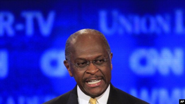 Businessman Herman Cain speaks during the first New Hampshire Republican presidential debate in Manchester, N.H., June 13, 2011.