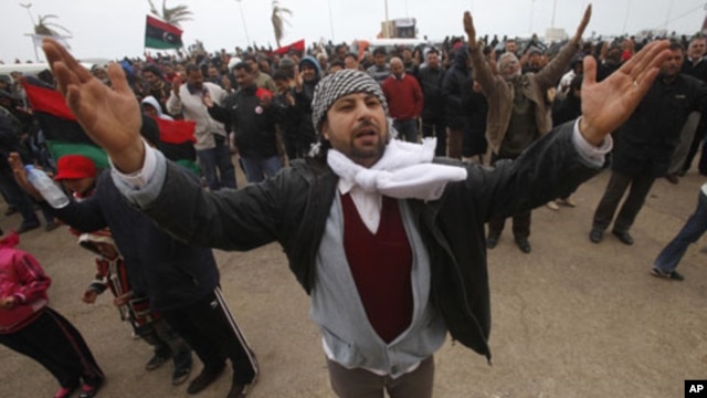 Protesters against the Libyan leader Moammar Gadhafi chant slogans during a demonstration in Benghazi, February 26, 2011