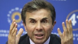 Georgia's billionaire and opposition leader Bidzina Ivanishvili speak to the media during press conference in Tbilisi, Georgia, Tuesday, Oct. 2, 2012. 