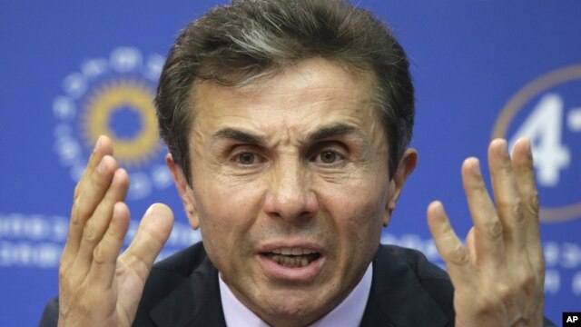 Georgia's billionaire and opposition leader Bidzina Ivanishvili speak to the media during press conference in Tbilisi, October 2, 2012. 