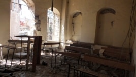 The interior of a damaged school is pictured in the old city of Homs, Syria, March 2, 2013.