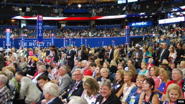 Delegates on the floor watching speakers at the Republican National Convention, Tampa, Florida, August 28, 2012. (J. Featherly/VOA)